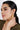 A model wearing Circular shaped hoop earrings featuring bezel-set clear quartz gemstones in 925 sterling silver with 18K gold plating