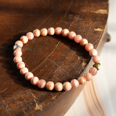 Rhodochrosite with heart charm