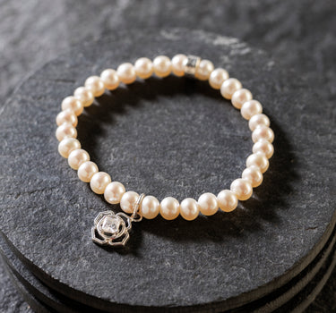 June - Pearl with flower charm