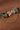 Gold-plated 925 sterling silver brooch featuring natural seraphinite gemstones, a snake motif with sparkling accents, and layered chain details.