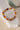 Wellness gemstone bracelet featuring Amethyst, Carnelian, and Citrine beads with 925 sterling silver accents on a white background.