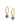 Gold-plated hoop earrings with floral charms featuring a bezel set green gemstone surrounded by cubic zirconia accents on white background.