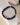 Migraine support gemstone bracelet featuring Sodalite, Lapis Lazuli, and Amethyst beads with 925 sterling silver accents on a white background.