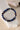 Migraine support gemstone bracelet featuring Sodalite, Lapis Lazuli, and Amethyst beads with 925 sterling silver accents on a white background.