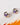 Hexagon stud earrings featuring bezel-set amethyst gemstones in 925 sterling silver with matte gold, polished gold, and rhodium-plated finishes.