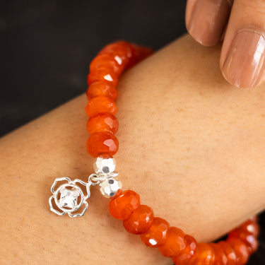 July - Carnelian with flower charm