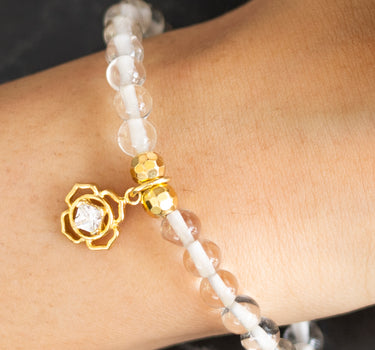 April - Clear Quartz with flower charm