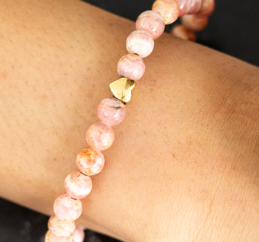 Rhodochrosite with heart charm