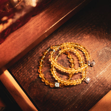 NOVEMBER- CITRINE WITH EVIL EYE CHARM