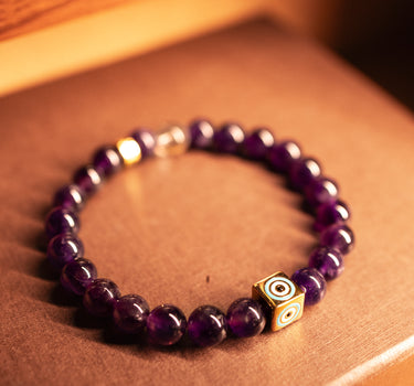 FEBRUARY- AMETHYST WITH EVIL EYE CHARM