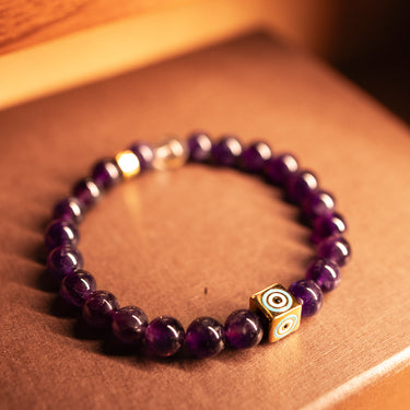 FEBRUARY- AMETHYST WITH EVIL EYE CHARM