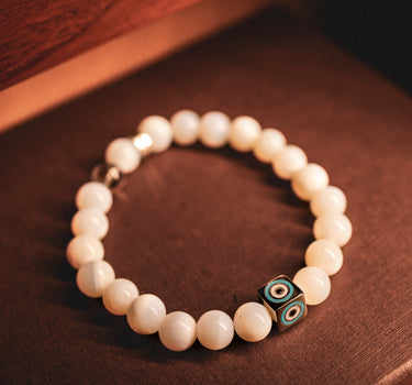 OCTOBER- OPAL WITH EVIL EYE CHARM