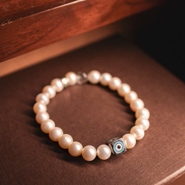JUNE-PEARL WITH EVIL EYE CHARM