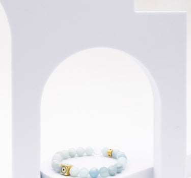 MARCH- AQUAMARINE WITH EVIL EYE CHARM