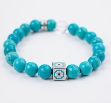 DECEMBER-TURQUOISE WITH EVIL EYE CHARM