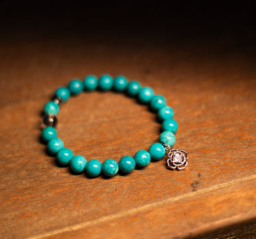 December - Turquoise with flower charm