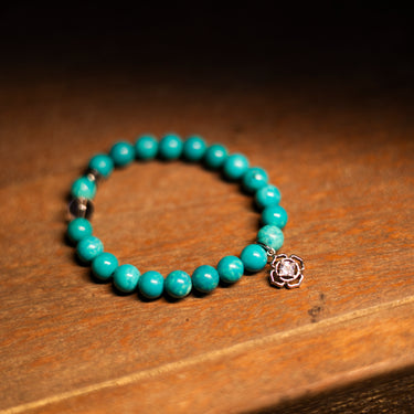 December - Turquoise with flower charm